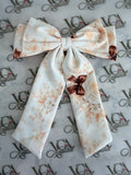 Cocoa rose waterfall bow