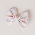 Rose buds and ribbons bow