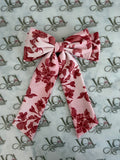 Ombré ruby waterfall bow