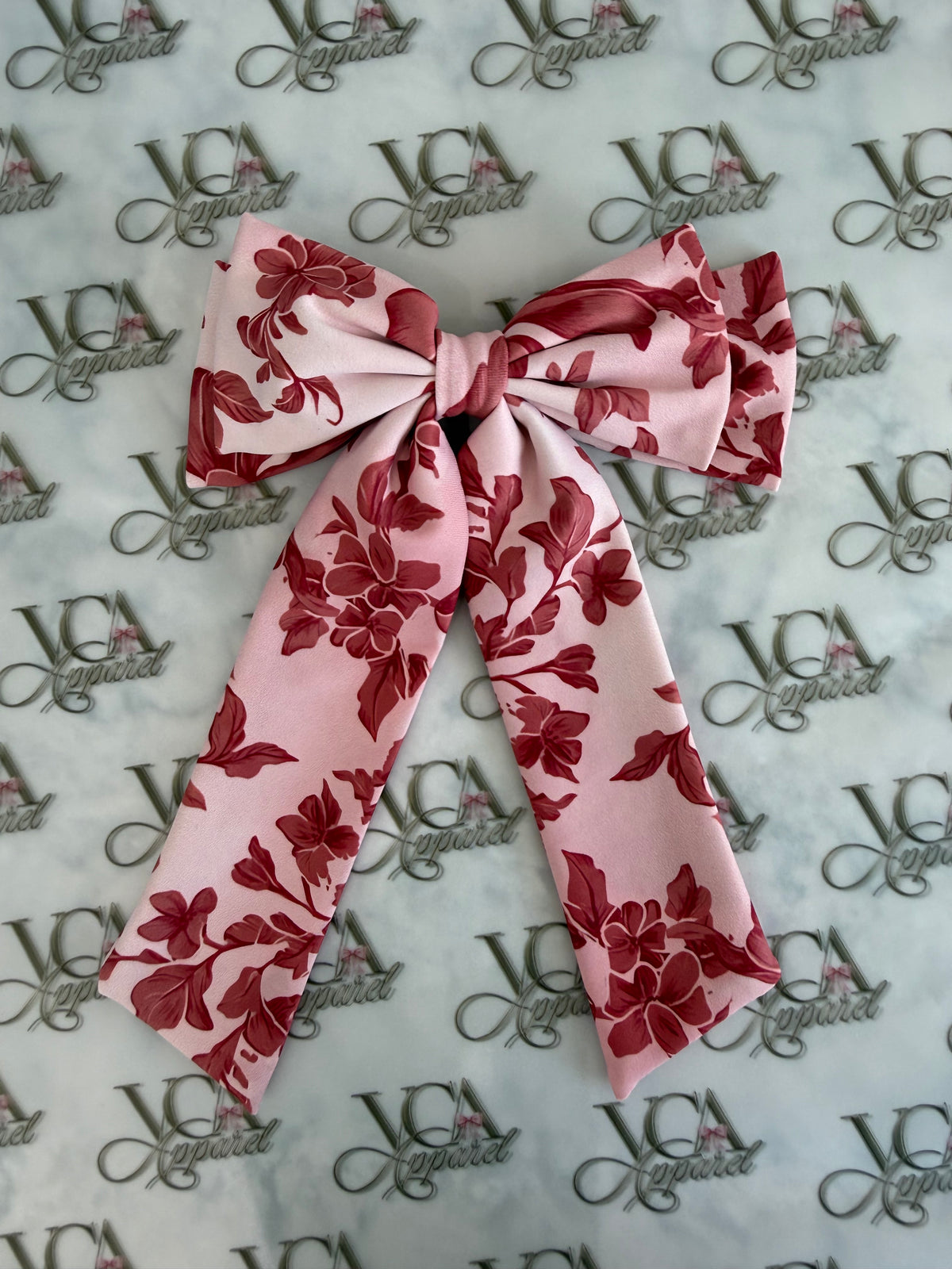 Ombré ruby waterfall bow